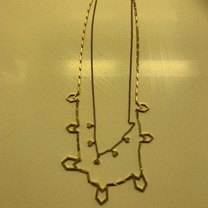 J.Crew long gold, geometric arrow necklace.